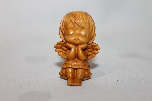 Kleine bezaubernde holzfigur - kleine,